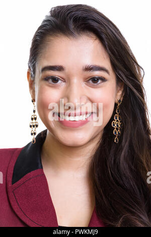 Face of young happy Indian businesswoman smiling Stock Photo