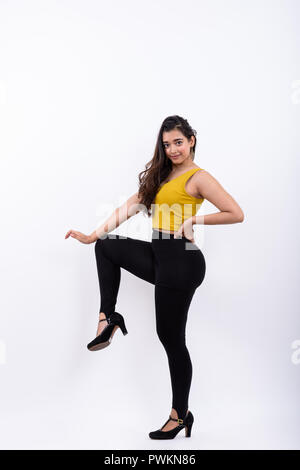 Full body shot of young beautiful Indian woman posing Stock Photo