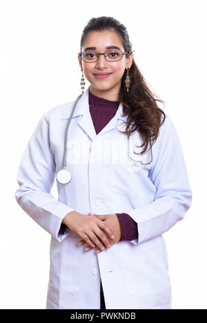 Studio shot of young beautiful Indian woman doctor Stock Photo