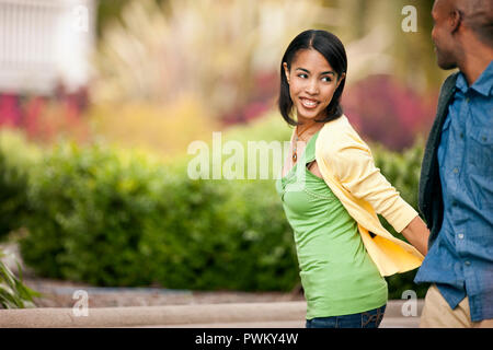 Young couple playfully holding hands. Stock Photo