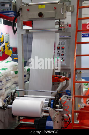 Bangkok, Thailand - September 19, 2018: Blow film extrusion for plastic bag display in A-Plas 2018 Stock Photo