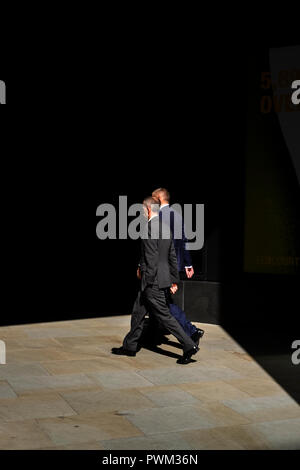 England,City of London-city workers marching to work in the financial district Stock Photo
