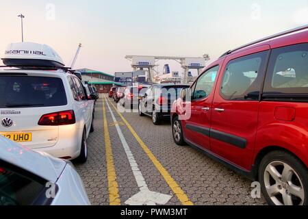 Dover, England - July 27 2018: Cars at the ferry port in early morning, waiting to board the cross channel ferry boat Stock Photo
