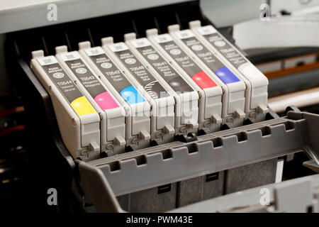 Color inkjet printer head and ink cartridges, close up - USA Stock Photo