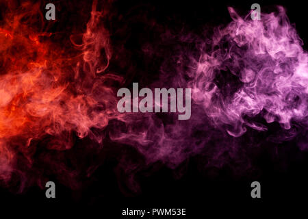 Textural background for creativity . Dense multicolored smoke of   red and pink colors on a black isolated background. Background of smoke vape Stock Photo