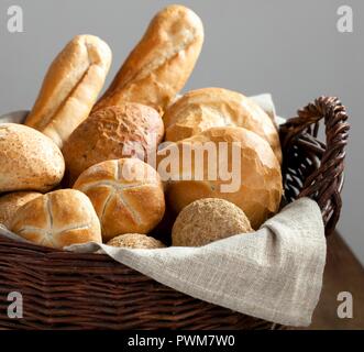Assorted bread rolls in a bread basket Stock Photo