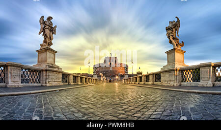 Panoramic low angle view of Sant'Angelo bridge and castle on sunrise in Rome, Italy (HDR image) Stock Photo