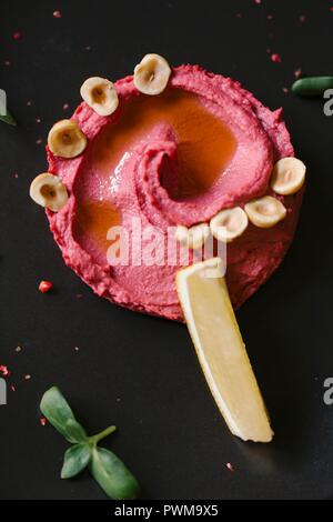Beetroot hummus with chickpeas Stock Photo
