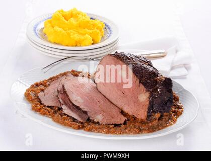 Pastissada di cavallo (horsemeat with polenta, Italy) Stock Photo