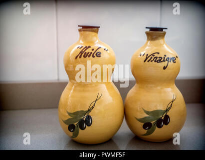 Containers of ceramics of oil and vinegar in a kitchen Stock Photo