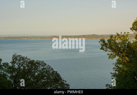 North Devon coastline at eveningtime. Viewed from cliffs above Clovelly. Stock Photo