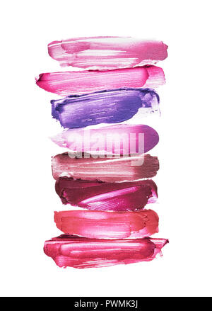 Smears of different colors are made with various lip gloss isolated on a white background. Texture of multi-colored strokes of various make-up cosmeti Stock Photo