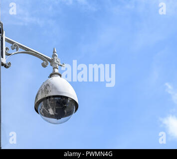 A circuit camera mounted on an ornate bracket. Stock Photo