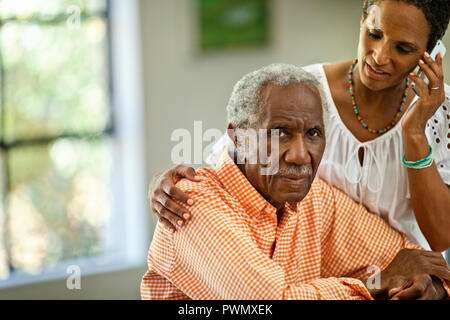 Happy senior man spending time with his middle aged son. Stock Photo