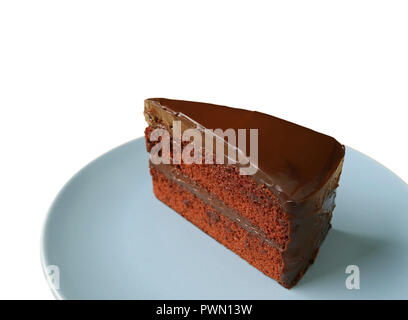 Texture of Chocolate Layer Cake Served on Light Blue Plate Isolated on White Background with Free Space for Text and Design Stock Photo