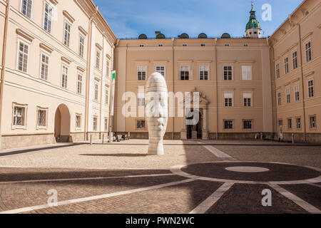 Salzburg, Austria - April 6, 2018: Awilda - monumental sculpture of head of a young woman with Carribean facial features. By Jaume Plensa. Stock Photo