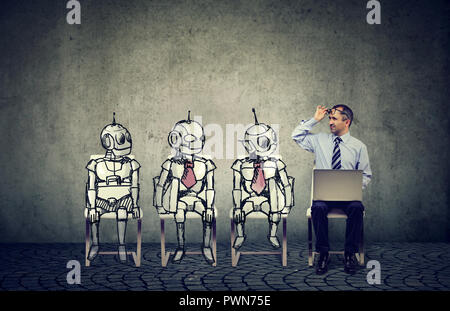 Human vs artificial intelligence concept. Business job applicant man competing with cartoon robots sitting in line for a job interview Stock Photo