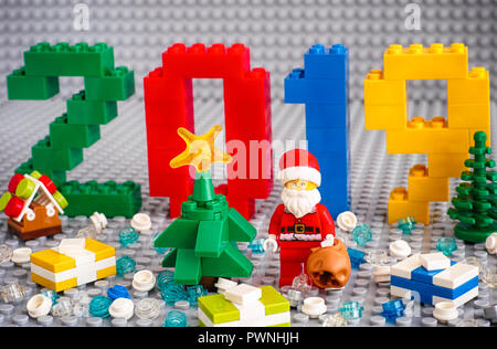 Tambov, Russian Federation - September 02, 2018 Numbers 2019 made by Lego blocks, christmas tree, Santa Clause with bag, presents and Lego round block Stock Photo