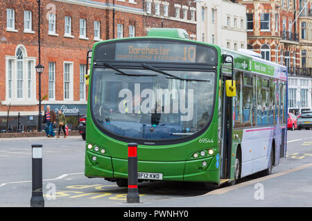 Number 10 bus to Dorchester County Hospital and Poundbury stopped at Weymouth, Dorset in October Stock Photo