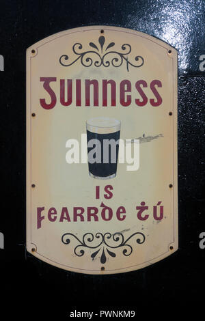 'Guinness is Good for You' sign in Gaelic (Irish). Stock Photo