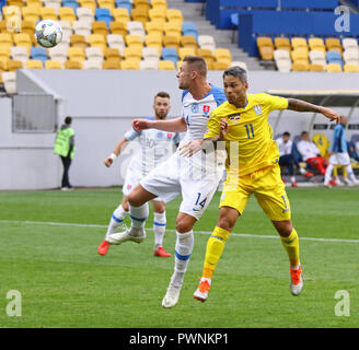 LVIV, UKRAINE - SEPTEMBER 9, 2018: Milan Skriniar of Slovakia (L) fights for a ball with Marlos of Ukraine during their UEFA Nations League game at Ar Stock Photo