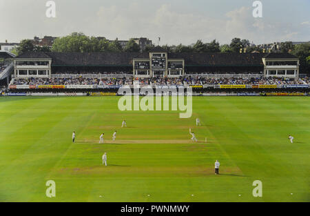 1987 Nat West Trophy final between Nottinghamshire v Northamptonshire. Lords cricket ground featuring the old grandstand and father time weather vane. St John’s Wood, London. UK. 1987 Stock Photo