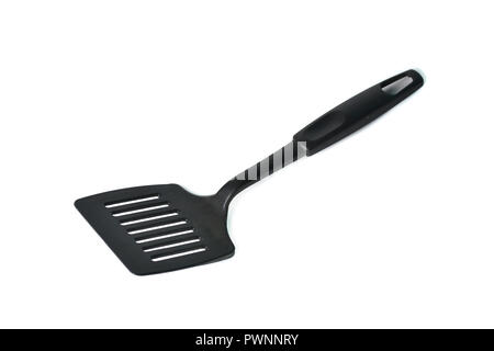 Black plastic kitchen spatula isolated on white background Stock Photo