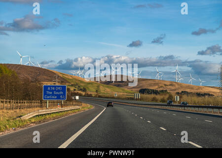 Wind farm on a hill roadside the M6, Cumbria, England, Uk Stock Photo