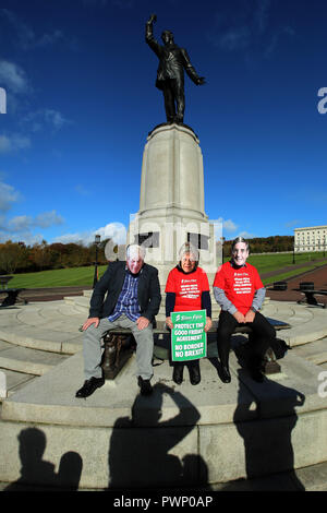 Belfast, Northern Ireland, UK. 17th Oct, 2018. Sinn Féin supporters with face masks of British Conservative Party key figures Boris Johnson, British Prime Minister Theresa May and Jacob Rees-Mogg pose outside Stormont Belfast, Wednesday 17th, October, 2018, Northern Ireland, North of Ireland. Sinn Fein MLAs and MPs will joined a Brexit protest at Stormont and at Queen's University Belfast comes before Theresa May this evenings visit to Brussels to speak to EU leaders as she battles to keep hopes of a Brexit deal alive. Credit: Irish Eye/Alamy Live News Stock Photo