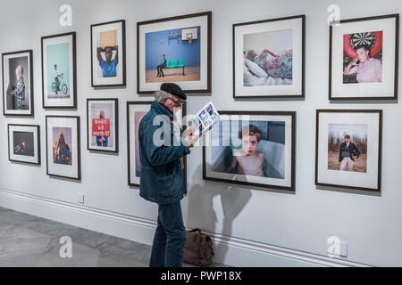 London, UK. 17th Oct, 2018. Shortlisted portraits on display at the National Portrait Gallery, London, as part of the Taylor Wessing Photographic Portrait Prize 2018 exhibition from 18 October 2018 to 27 January 2019. Credit: Guy Bell/Alamy Live News