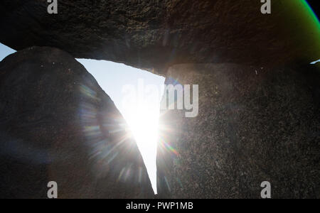 ILLUSTRATION - 17 October 2018, Saxony-Anhalt, Drosa: 17 October 2018, Germany, Drosa: The sun shines into the interior of the big stone tomb Teufelskeller. The ground monument dates back to the Neolithic period. In the morning, the monument information system of Saxony-Anhalt was released on the Internet. The website lists all monuments of the federal state, shows its position on the map and gives basic information about the respective monument. The data had been collected over many years by the State Office for Monument Preservation and Archaeology. Photo: Klaus-Dietmar Gabbert/dpa-Zentralbi Stock Photo