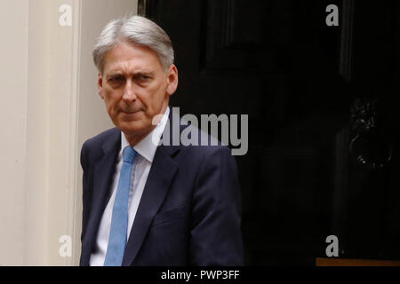 London, UK. 17th Oct, 2018. Britain's Chancellor of the Exchequer Philip Hammond leaves, Downing Street ahead of Prime Ministers Questions in London, Wednesday October 17, 2018. Credit: Luke MacGregor/Alamy Live News