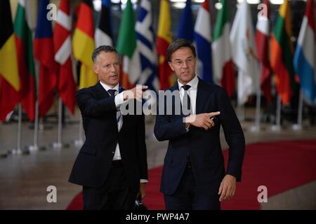 Brussels, Belgium. 17th Oct, 2018. Dutch Prime Minister Mark Rutte, right, arrives to the EU summit in Brussels today, on Wednesday, October 17, 2018. The summit is to primarily deal with the current state of the Brexit talks. Credit: Jakub Dospiva/CTK Photo/Alamy Live News Stock Photo