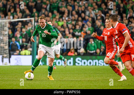 Aviva Stadium, Dublin, Ireland. 16th Oct, 2018. UEFA Nations League  football, Ireland versus Wales; Irish supporters in green body paint and  tricolour wigs Credit: Action Plus Sports/Alamy Live News Stock Photo 