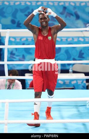 Buenos Aires, Argentina. 17th Oct, 2018. Keno Machado of Brazil celebrates after the Men's Middle (75kg) Gold Medal Bout at the 2018 Summer Youth Olympic Games in Buenos Aires, Argentina, on Oct. 17, 2018. Keno Machado won the gold medal by defeating Farid Douibi with 5-0. Credit: Li Ming/Xinhua/Alamy Live News Stock Photo