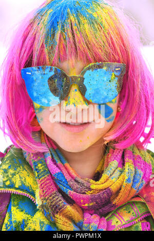 Portrait of girl painted by holi paints Stock Photo