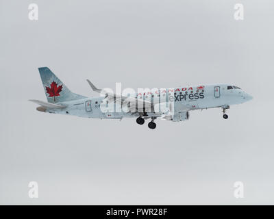 Quebec,Canada. An Air Canada Embraer ERJ-175SU  approaching YUL Montreal-Pierre Elliott Trudeau international airport in Dorval. Stock Photo