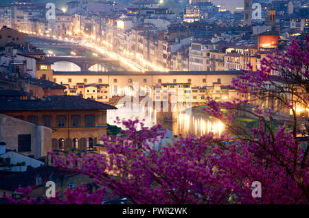 View of Ponte Vecchio Old Bridge in Florence from Piazzale Michelangelo at evening during blue hour Stock Photo