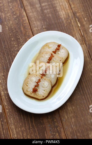 osmanthus flavored, stuffed lotus root with glutinous rice, chinese food Stock Photo