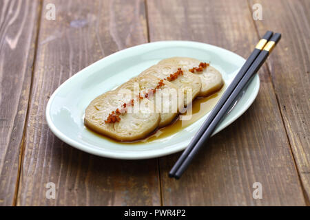 osmanthus flavored, stuffed lotus root with glutinous rice, chinese food Stock Photo