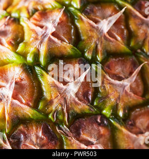 Close-up of pineapple skin, texture of fruit. Tropical exotic fruts background. Stock Photo