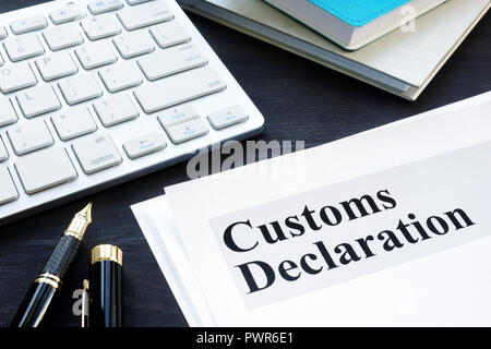 Customs declaration on the desk. Customs clearance. Stock Photo