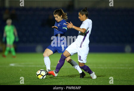 Chelsea Women's Karen Carney (left) and Fiorentina Femminile Sofia Kongouli (right) battle for the ball during the Women's Champions League first leg match at Kingsmeadow, London. Stock Photo