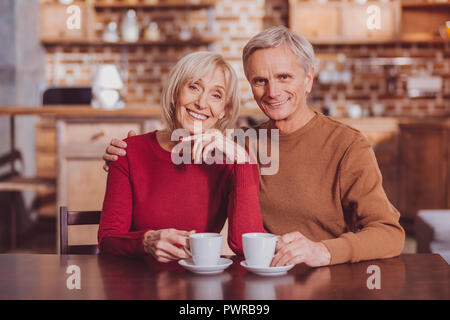 Happy spouses having lunch together Stock Photo