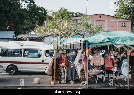 Bridgetown, Barbados - June 26, 2018: Clothes on sale at a street market stall in Bridgetown, the capital of Barbados and a port city on the island’s  Stock Photo