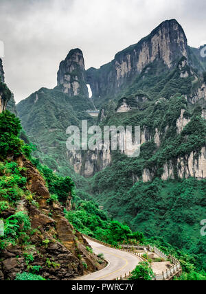 The longest cableway in the world, landscape view with mountains, peaks and the Haven's Gate Cave within the mist - Tianmen Mountain, The Heaven's Gat Stock Photo