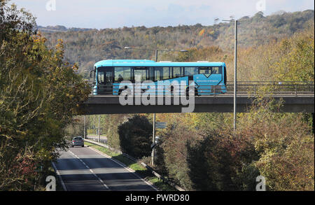 University of Brighton Shuttle Bus UB1 passes over the A27 on route to the Falmer Campus. 16 October 2018. Stock Photo