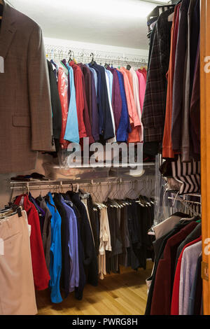 Extremely full residential walk-in closet, USA Stock Photo