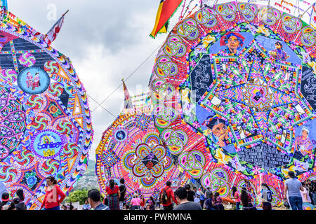 Santiago Sacatepequez, Guatemala - November 1, 2017: Giant kite festival honoring spirits of the dead in town cemetery each year on All Saints Day. Stock Photo