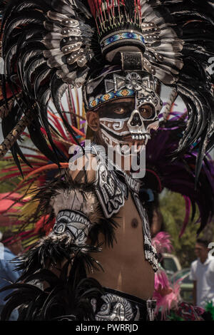 Portrait of aztec warrior painted skull in parade and celebration of the virgin zapopan Stock Photo